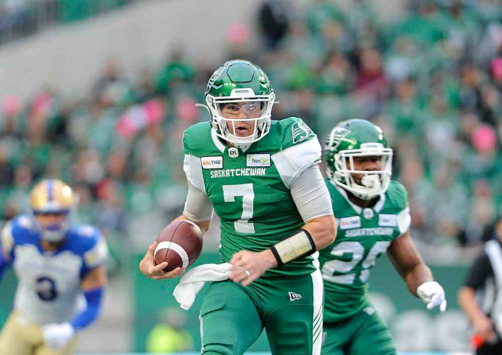 MARK TAYLOR / THE CANADIAN PRESS
Saskatchewan Roughriders quarterback Cody Fajardo (7) scrambles during first half CFL action against the Winnipeg Blue Bombers, in Regina on Saturday, Oct. 5, 2019.