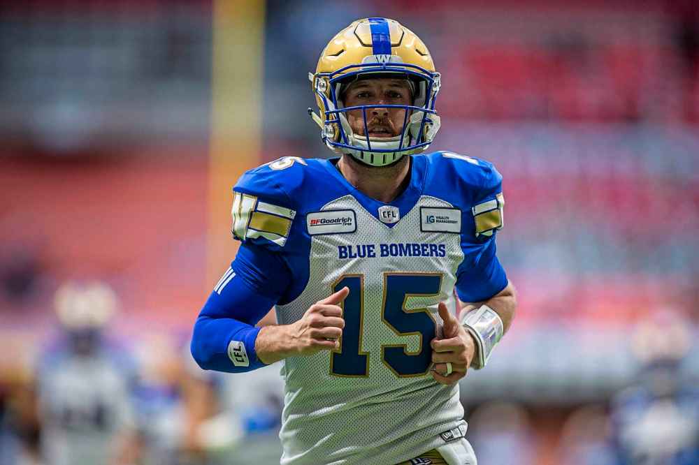 BEN NELMS / THE CANADIAN PRESS
Winnipeg Blue Bombers quarterback Matt Nichols (15) takes part in the warm-ups prior to facing the B.C. Lions.