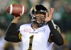 Ryan Remiorz / Canadian Press files
Hamilton Tiger-Cats quarterback Henry Burris fires a pass against the Saskatchewan Roughriders during the 2013 Grey Cup in Regina.
