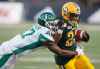 CP
Saskatchewan Roughriders' Crezdon Butler (17) tackles Edmonton Eskimos' LaDarius Perkins (22) during first half CFL action in Edmonton, Alta., on Friday August 25, 2017. THE CANADIAN PRESS/Jason Franson.