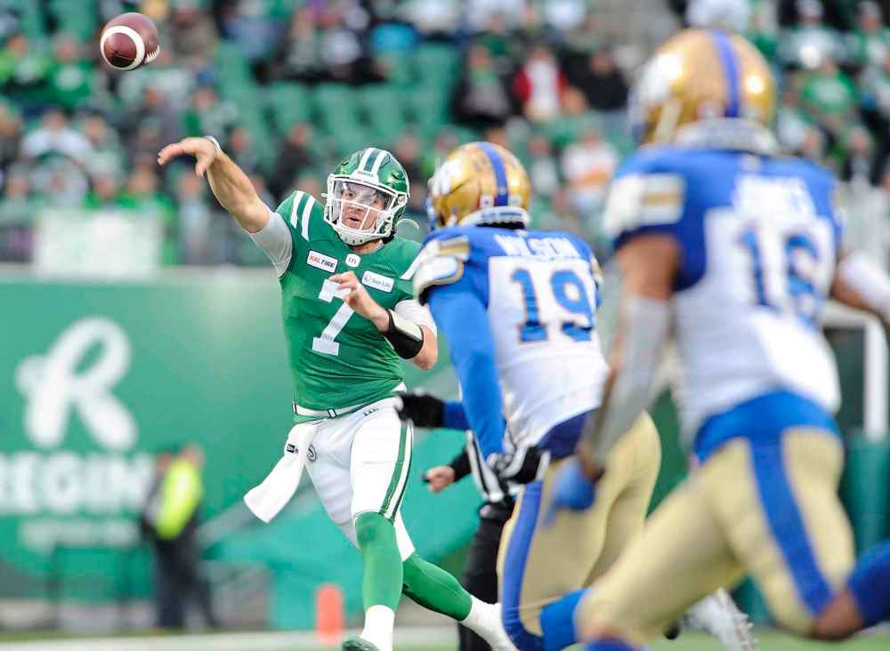 MARK TAYLOR / THE CANADIAN PRESS
Saskatchewan Roughriders quarterback Cody Fajardo attempts a pass on the run against the Winnipeg Blue Bombers during first half action.