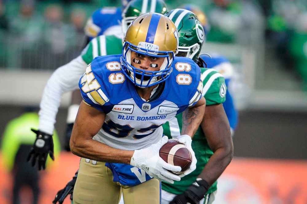 MARK TAYLOR / THE CANADIAN PRESS
Winnipeg Blue Bombers' Kenny Lawler runs the ball.