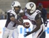 Graham Hughes / THE CANADIAN PRESS files 
Quarterback Henry Burris (left) and running back Chevon Walker will have a lot to say about whether the Redblacks will have a successful debut.