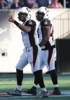 John Woods / The Canadian Press 
Ottawa Redblacks quarterback Henry Burris (1) signals to the Winnipeg Blue Bombers that he is OK after a late hit during the first half of CFL action in Winnipeg Saturday.