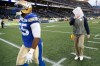 John Woods / The Canadian Press files 
Winnipeg Blue Bombers head coach Mike O'Shea covers his face as he and Jamaal Westerman (55) walk off the field after the Ottawa Redblacks defeated them in Winnipeg Saturday.