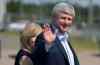 Adrian Wyld / The Canadian Press
Conservative leader Stephen Harper waves as he walks with his wife Laureen to the campaign plane in Trois Rivieres,  Que., on Friday, Sept. 11.