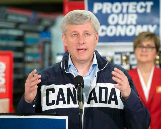 CPConservative Leader Stephen Harper speaks to the media while campaigning at a hardware show Monday in St. Jacobs, Ont. (Ryan Remiorz/THE CANADIAN PRESS)