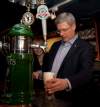 ADRIAN WYLD / THE CANADIAN PRESS
Stephen Harper pours a pint at a brewery pub during a stop in Halifax.