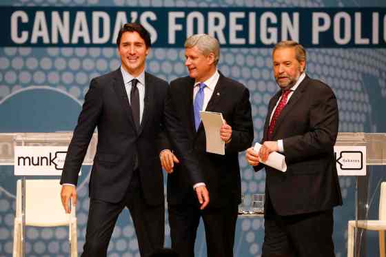 MARK BLINCH / THE CANADIAN PRESS / POOLLiberal Leader Justin Trudeau (from left), Conservative Leader Stephen Harper and NDP Leader Tom Mulcair leave the stage following Monday's Munk Debate.