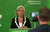 Chad Hipolito / THE CANADIAN PRESS
Twitter Canada, Steve Ladurantaye, records Green Party leader Elizabeth May, on his smartphone, to be uploaded to Twitter as she live-tweets to leaders during the Globe and Mail leaders' debate, in Victoria, B.C., on Thursday.