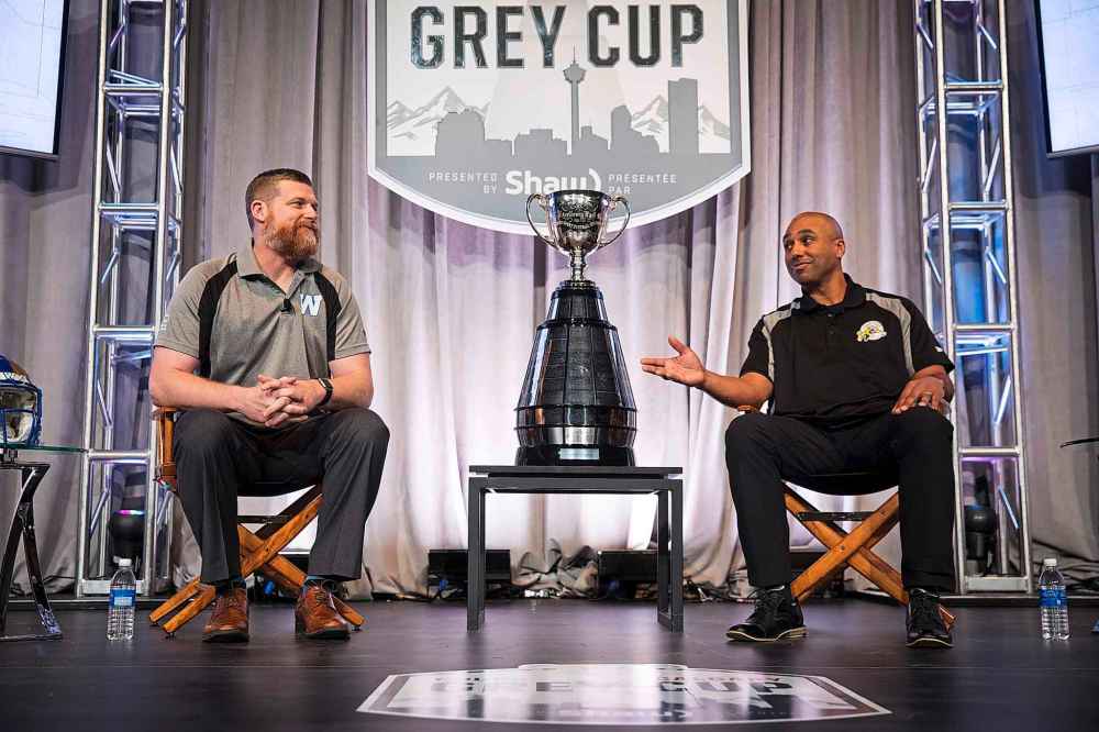 THE CANADIAN PRESS/Todd Korol
Winnipeg Blue Bombers head coach Mike O'Shea, left, and Hamilton Tiger-Cats head coach Orlondo Steinauer during the coaches news conference in Calgary, Wednesday.