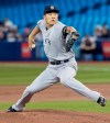 New York Yankees starting pitcher Masahiro Tanaka throws in first inning of American League MLB baseball action against the Toronto Blue Jays, in Toronto on Tuesday, June 4, 2019. The Yankees placed right-hander Tanaka on the paternity leave list.THE CANADIAN PRESS/Fred Thornhill