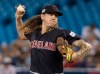 Cleveland Indians starting pitcher Mikel Clevinger throws during first inning American League MLB baseball action against the Toronto Blue Jays, in Toronto, Monday, July 22, 2019. THE CANADIAN PRESS/Fred Thornhill