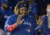 Toronto Blue Jays' Vladimir Guerrero Jr. in his second big league game smiles for the television camera looking into the dugout in the sixth inning of their American League MLB baseball game against the Oakland Athletics in Toronto Saturday April 27, 2019. THE CANADIAN PRESS/Fred Thornhill