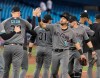 Arizona Diamondbacks players celebrate defeating the Toronto Blue Jays in their Interleague baseball game in Toronto Friday June 7, 2019. THE CANADIAN PRESS/Fred Thornhill