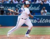 Toronto Blue Jays' Vladimir Guerrero Jr. hits a triple to score two runs in the seventh inning of their American League MLB baseball game against the New York Yankees in Toronto Saturday August 10, 2019. THE CANADIAN PRESS/Fred Thornhill