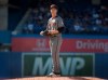Arizona Diamondbacks starting pitcher Zack Greinke takes a pause on the mound in the sixth inning of their MLB Interleague baseball game against the Toronto Blue Jays, in Toronto, Saturday, June 8, 2019. THE CANADIAN PRESS/Fred Thornhill