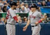 Boston Red Sox' Brock Holt comes in to score on a single by Xander Bogaerts in the seventh inning of their American League MLB baseball game against the Toronto Blue Jays in Toronto on Thursday, September 12, 2019. THE CANADIAN PRESS/Fred Thornhill