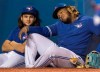 Toronto Blue Jays Vladimir Guerrero Jr. and Bo Bichette sit this one out at edge of dugout in eighth inning of their American League MLB baseball game against the Tampa Bay Rays in Toronto Saturday September 28, 2019. THE CANADIAN PRESS/Fred Thornhill