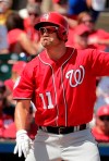 Washington Nationals' Ryan Zimmerman (11) reacts at bat during an exhibition spring training baseball game against the St. Louis Cardinals on Monday, March 11, 2019, in Jupiter, Fla. (AP Photo/Brynn Anderson)