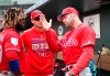 Philadelphia Phillies center fielder Odubel Herrera, left, and Philadelphia Phillies manager Gabe Kapler, right, talk in the dugout in the fourth inning during an exhibition spring training baseball game against the St. Louis Cardinals on Monday, March 18, 2019, in Jupiter, Fla. (AP Photo/Brynn Anderson)