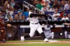 Miami Marlins' Harold Ramirez hits a single during the first inning of a baseball game against the Arizona Diamondbacks, Sunday, July 28, 2019, in Miami. (AP Photo/Brynn Anderson)