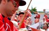 St. Louis Cardinals' Paul Goldschmidt (46) signs autographs for fans before an exhibition spring training baseball game against the Miami Marlins on Wednesday, March 13, 2019, in Jupiter, Fla. (AP Photo/Brynn Anderson)