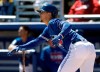 Toronto Blue Jays' Cavan Biggio watches his home run off Philadelphia Phillies starting pitcher Vince Valasquez during the second inning of a spring training baseball game Wednesday, March 6, 2019, in Dunedin, Fla. (AP Photo/Chris O'Meara)