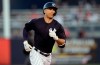 New York Yankees' Giancarlo Stanton runs around the bases after his home run off Philadelphia Phillies starting pitcher Jerad Eickhoff during the third inning of a spring training baseball game Friday, March 22, 2019, in Tampa, Fla. (AP Photo/Chris O'Meara)