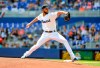 Miami Marlins' starting pitcher Sandy Alcantara throws during the first inning of a baseball game against the Colorado Rockies, Sunday, March 31, 2019, in Miami.(AP Photo/Gaston De Cardenas)