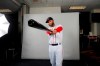 Boston Red Sox second baseman Dustin Pedroia sets up for a portrait during media day at their spring training baseball facility in Ft. Myers, Fla., Tuesday, Feb. 19, 2019. (AP Photo/Gerald Herbert)