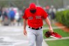 Boston Red Sox starting pitcher Nathan Eovaldi walks to the practice field as pitchers and catchers report for their first workout at their spring training baseball facility in Ft. Myers, Fla., Wednesday, Feb. 13, 2019. (AP Photo/Gerald Herbert)