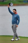 Jon Rahm waves his cap during the final round of The Players Championship golf tournament Sunday, March 17, 2019 in Ponte Vedra Beach, Fla. (Bob Self/The Florida Times-Union via AP)