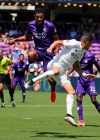 Orlando City's Tesho Akindele, left, and Emmanuel Ledesma try to control a corner kick during the first half of an MLS soccer match, Sunday, May 19, 2019, in Orlando, Fla. (AP Photo/John Raoux)