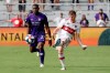 Chicago Fire's Bastian Schweinsteiger, right, passes the ball in front of Orlando City's Kamal Miller (27) during the first half of an MLS soccer match, Sunday, Oct. 6, 2019, in Orlando, Fla. (AP Photo/John Raoux)
