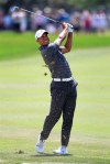 Tiger Woods hits a shot to the green from the first fairway during the third round of the Arnold Palmer Invitational golf tournament at Bay Hill, Saturday, March 24, 2012, in Orlando, Fla. (AP Photo/John Raoux)