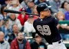 New York Yankees' Aaron Judge hits a triple to drive in two runs in fifth inning of a spring baseball exhibition game against the Atlanta Braves, Monday, March 18, 2019, in Kissimmee, Fla. (AP Photo/John Raoux)