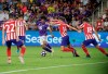 Los Angeles FC forward Carlos Vela (10) tries to moves the ball past Atletico Madrid midfielder Marcos Llorente (14), defender Felipe (18) and defender Mario Hermoso (22) during the first half of the MLS All-Star soccer match Wednesday, July 31, 2019, in Orlando, Fla. (AP Photo/John Raoux)