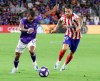 Orlando City midfielder Nani (17) moves the ball past Atletico Madrid midfielder Vitolo (20) during the first half of the MLS All-Star soccer match Wednesday, July 31, 2019, in Orlando, Fla. (AP Photo/John Raoux)