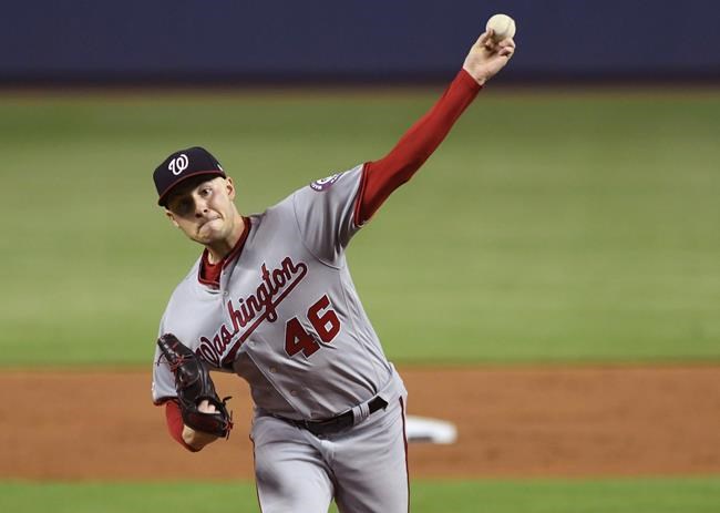 Washington Nationals starting pitcher Patrick Corbin throws to a Miami Marlins batter during the first inning of a baseball game Wednesday, June 26, 2019, in Miami. (AP Photo/Jim Rassol)