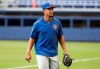 New York Mets' outfielder Carlos Gomez walks on the field before a baseball game against the Miami Marlins, Friday, May 17, 2019, in Miami. New York selected Gomez's contract from Triple-A Syracuse and have him batting sixth and in right field against the Marlins on Friday. (AP Photo/Lynne Sladky)
