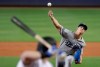 Los Angeles Dodgers starting pitcher Walker Buehler delivers to Miami Marlins' Garrett Cooper during the first inning of a baseball game, Thursday, Aug. 15, 2019, in Miami. (AP Photo/Lynne Sladky)