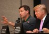 Golf course designer Gil Hanse, left, speaks during a news conference at the Cadillac Championship golf tournament, as Donald Trump, right, looks on, Thursday, March 8, 2012, in Doral, Fla. Trump purchased the Doral Hotel & Country Club, which includes four championship golf courses. (AP Photo/Lynne Sladky)