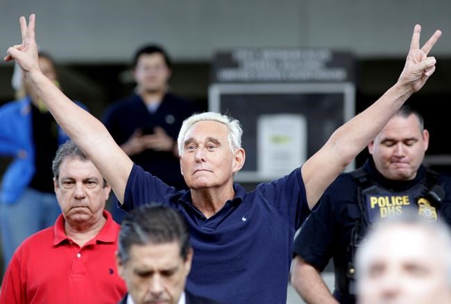Former campaign adviser for President Donald Trump, Roger Stone walks out of the federal courthouse following a hearing, Friday, Jan. 25, 2019, in Fort Lauderdale, Fla. Stone was arrested Friday in the special counsel's Russia investigation and was charged with lying to Congress and obstructing the probe. (AP Photo/Lynne Sladky)