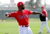 Philadelphia Phillies' Andrew McCutchen does drills at the Phillies spring training baseball facility, Tuesday, Feb. 19, 2019, in Clearwater, Fla. (AP Photo/Lynne Sladky)
