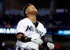 Miami Marlins' Starlin Castro walks to the dugout after grounding out during the fourth inning of a baseball game against the Atlanta Braves, Sunday, May 5, 2019, in Miami. (AP Photo/Lynne Sladky)