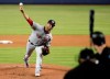 Washington Nationals starting pitcher Anibal Sanchez, left, delivers to Miami Marlins' Neil Walker, right, during the first inning of a baseball game, Friday, April 19, 2019, in Miami. (AP Photo/Lynne Sladky)