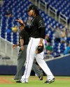 Miami Marlins starting pitcher Jose Urena reacts after giving up a solo home run to Atlanta Braves' Freddie Freeman during the first inning of a baseball game Friday, May 3, 2019, in Miami. (AP Photo/Lynne Sladky)