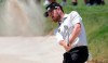 Louis Oosthuizen hits from the bunker on the first hole during the final round of the Valspar Championship golf tournament Sunday, March 24, 2019, in Palm Harbor, Fla. (AP Photo/Mike Carlson)