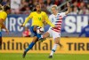 Brazil's Adriana and United States' Megan Rapinoe battle for a loose ball during the first half of a SheBelieves Cup soccer match Tuesday, March 5, 2019, in Tampa, Fla. (AP Photo/Mike Carlson)